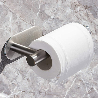 Toilet paper holder attached to a bathroom wall
