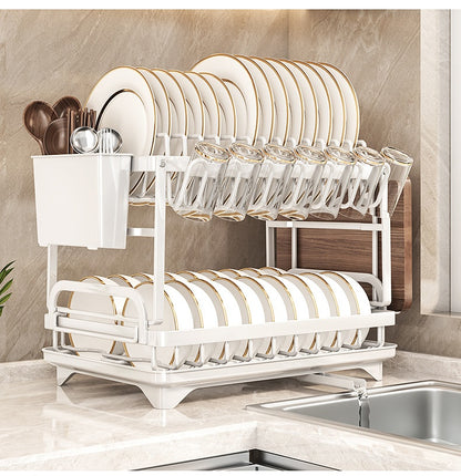 Dish rack holding plates, bowls, cups, and utensils
