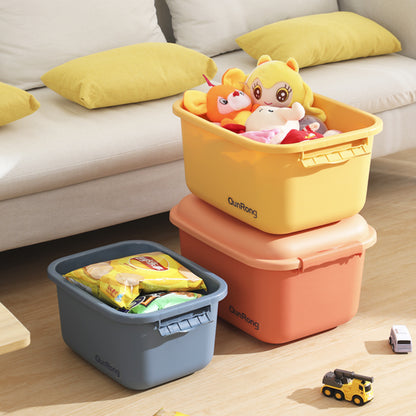 Toy storage box shown open with children's items inside
