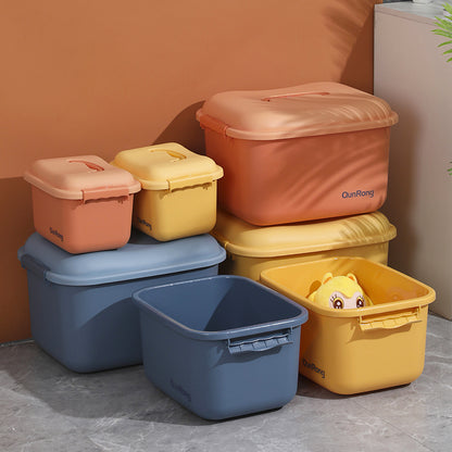 Close view of the toy storage box lid and front opening

