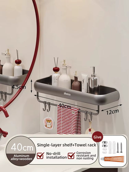 Two-tier bathroom storage shelf holding toiletries
