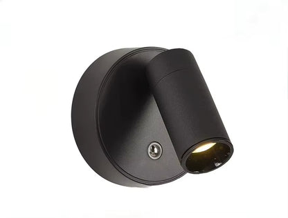 Black wall lamp tilted to show its adjustable angle
