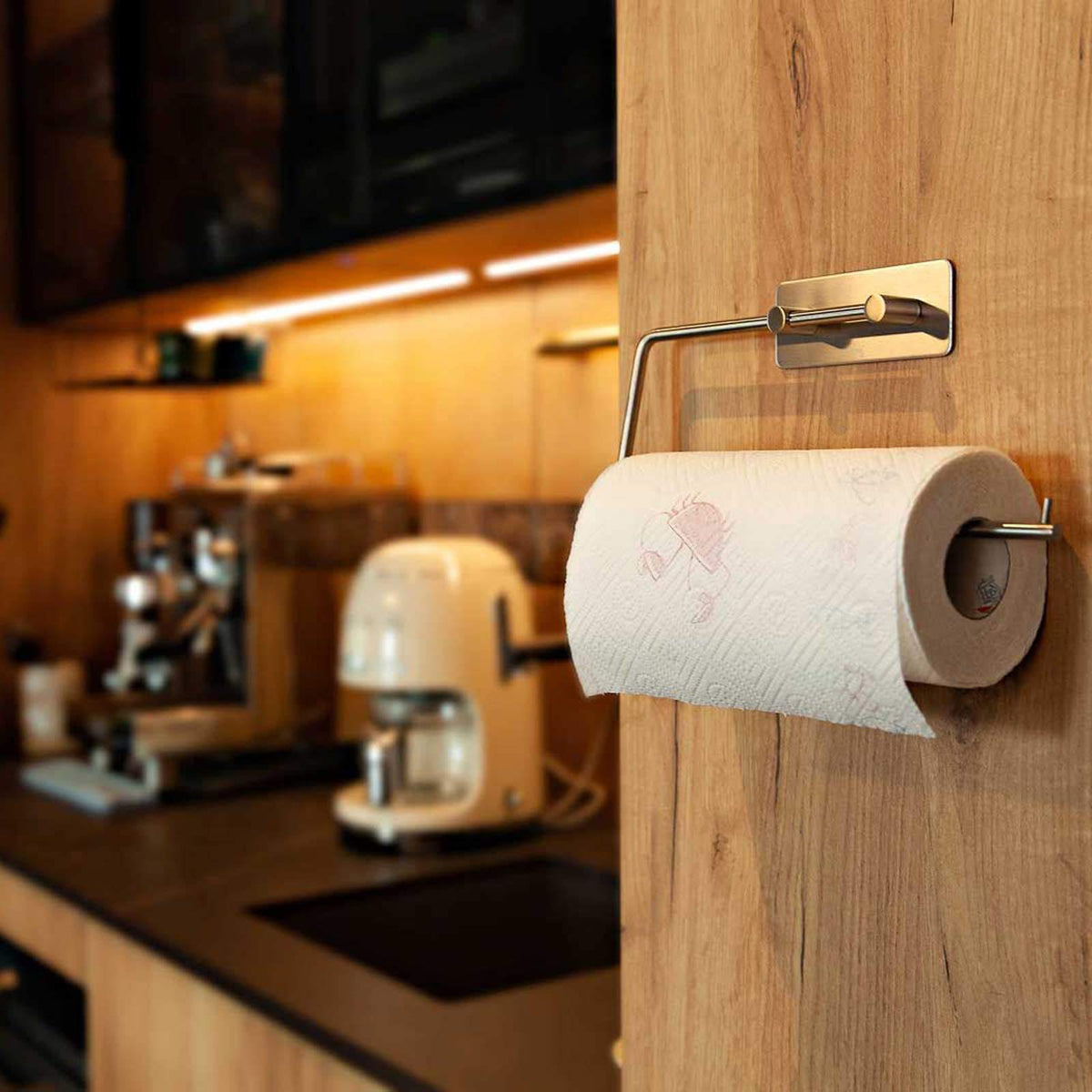 Tissue roll holder mounted on a bathroom wall

