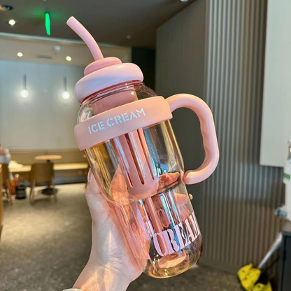 Reusable tumbler showing the fitted lid and drinking straw

