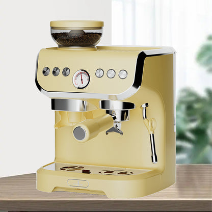 Vintage-style yellow espresso machine on a wooden surface with a blurred green plant in the background.