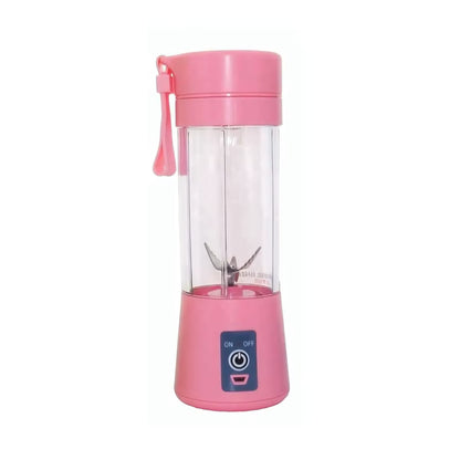 Pink portable blender with clear container on a white background.