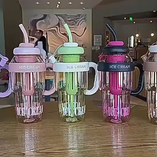 Video showing the 300ml reusable tumbler with handle, lid, and straw


