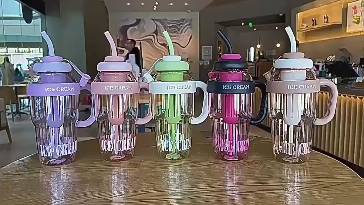 Video showing the 300ml reusable tumbler with handle, lid, and straw

